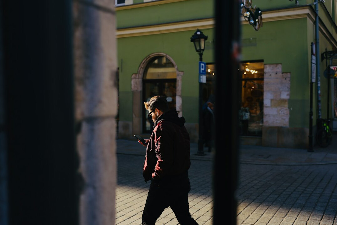 Portrait of an older Polish male photographer with glasses